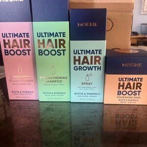 New in box! 4 piece Moerie hair care set.  Promotes hair growth and repair.